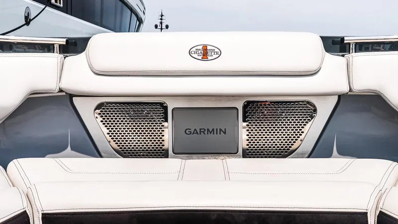  Yacht Photos Pics 2025 Cigarette 52 Thunder boat interior with Garmin technology and sleek white seating.