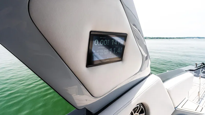  Yacht Photos Pics Cigarette 52 Thunder 2025 boat with GPS display, sleek design, and scenic water view.