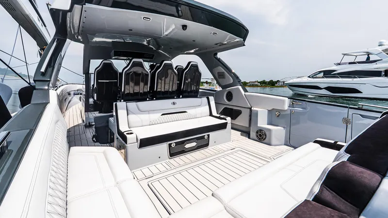  Yacht Photos Pics Luxurious 2025 Cigarette 52 Thunder yacht interior with sleek seating and modern design.