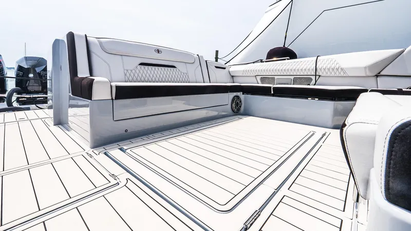  Yacht Photos Pics Luxury seating on 2025 Cigarette 52 Thunder boat deck, featuring sleek design and modern upholstery.