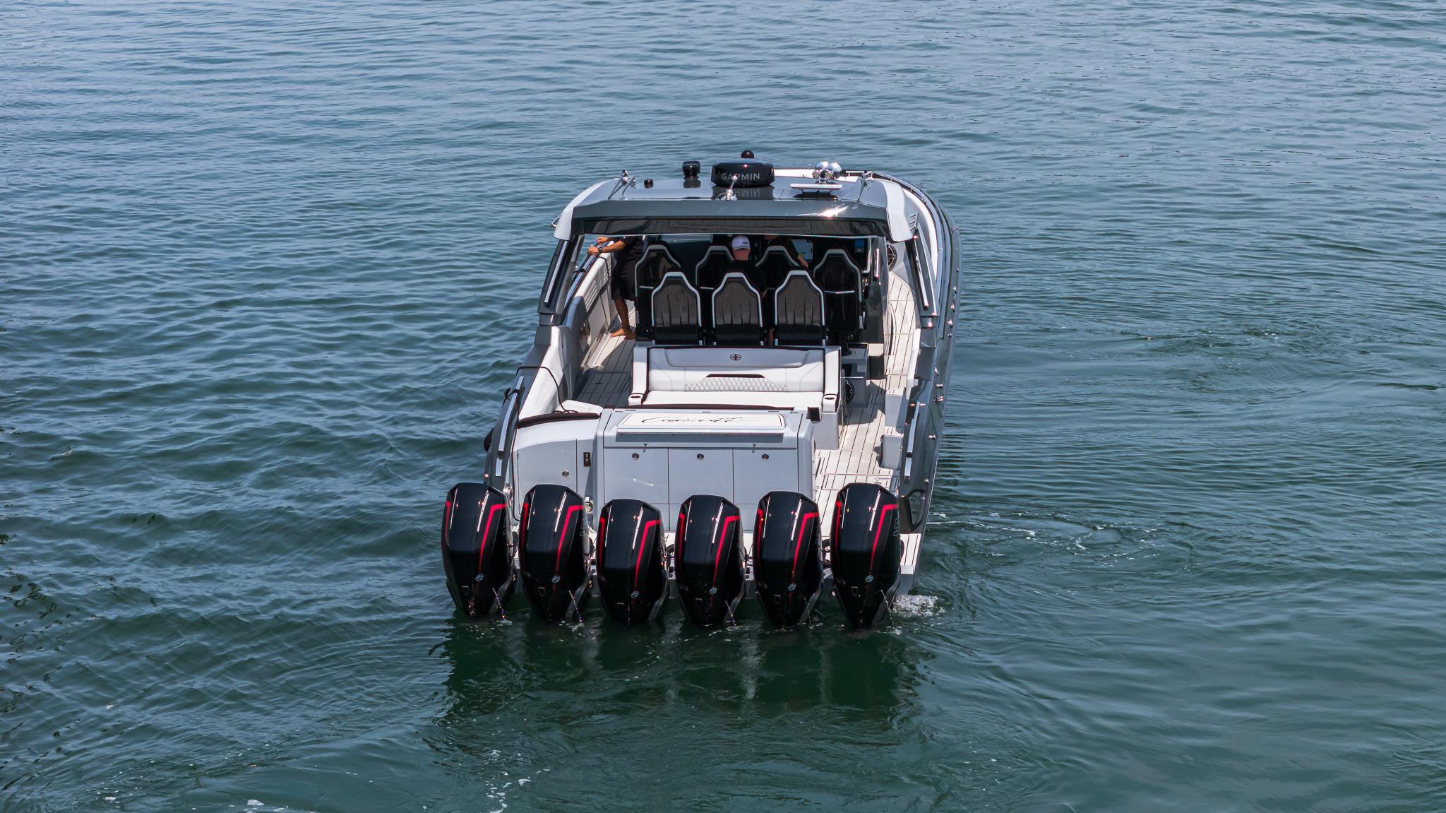 2025 Cigarette 52 Thunder boat with multiple engines on open water.