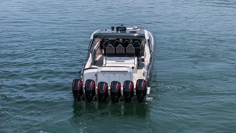  Yacht Photos Pics 2025 Cigarette 52 Thunder boat with multiple engines on open water.