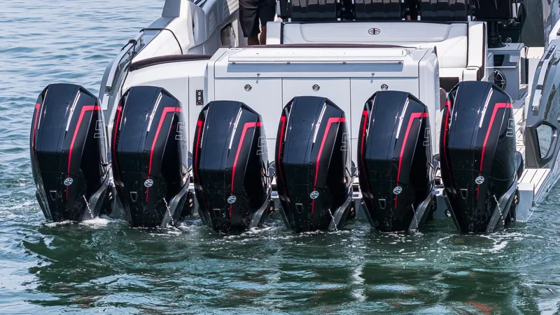  Yacht Photos Pics 2025 Cigarette 52 Thunder boat with six powerful outboard engines on water.