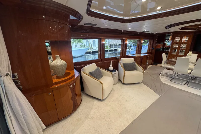 Aleniel Yacht Photos Pics Luxurious interior of 2005 Johnson 87' Motor Yacht with elegant seating and decor.