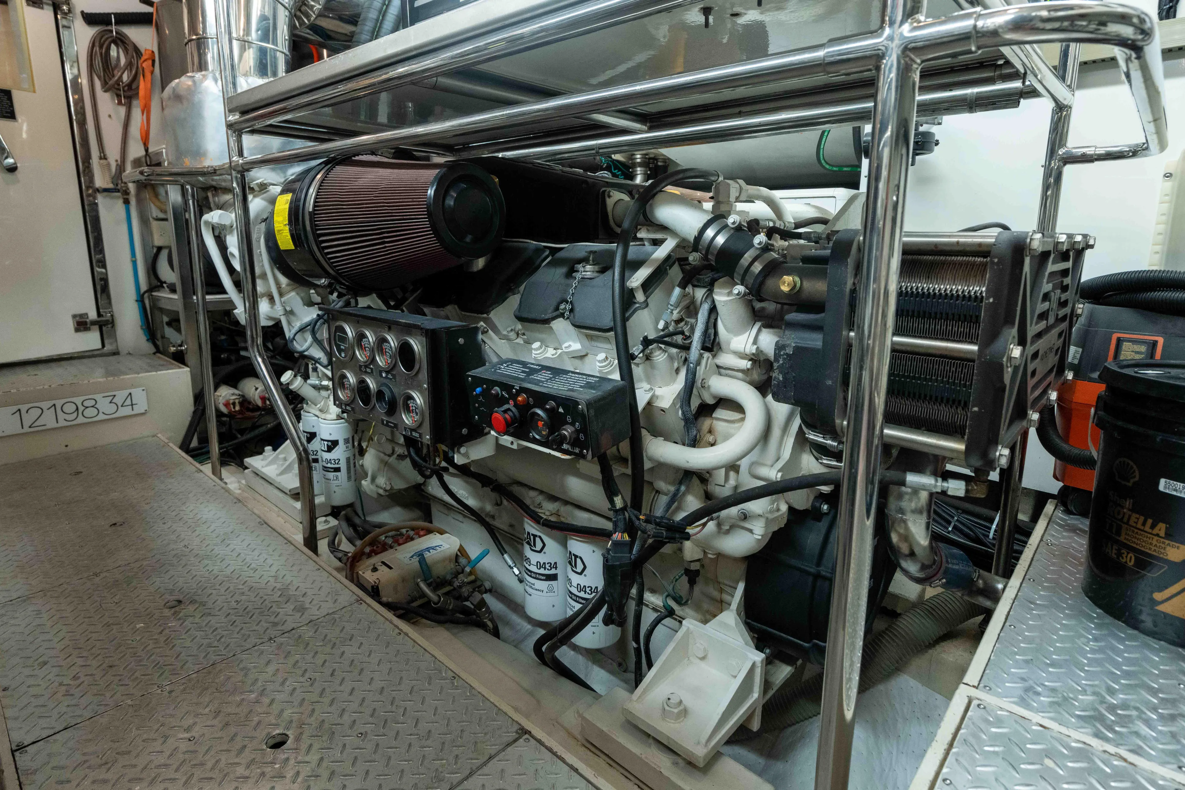 Aleniel Yacht Photos Pics Engine room of a 2005 Johnson 87' Motor Yacht, showcasing machinery and equipment.