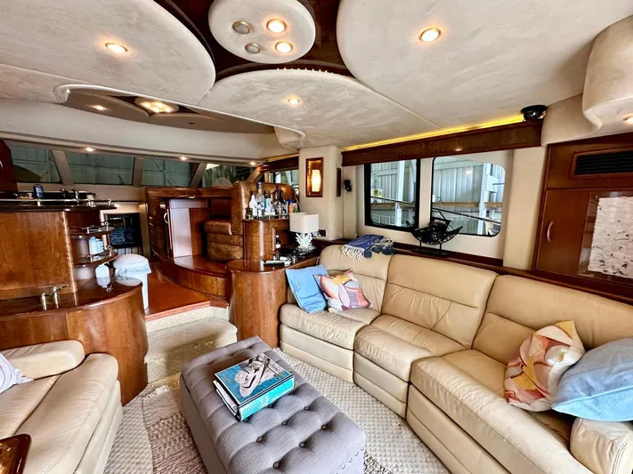 Hippeace Yacht Photos Pics Luxurious 2009 Silverton Ovation 52 yacht interior with plush seating and elegant wood finishes.