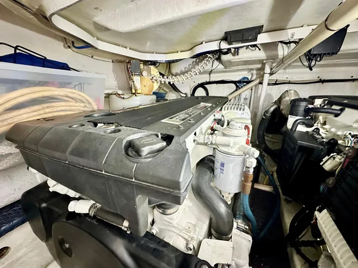 Hippeace Yacht Photos Pics Engine room of a 2009 Silverton Ovation 52 yacht, showcasing mechanical components.