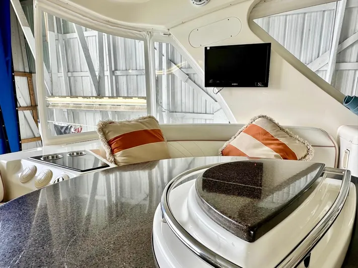 Hippeace Yacht Photos Pics Luxurious interior of 2009 Silverton Ovation 52 yacht with plush seating and modern amenities.