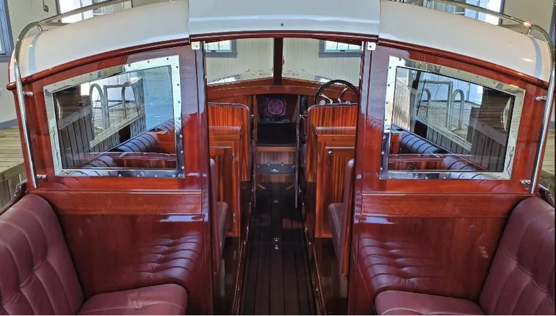 Luv N It Yacht Photos Pics Luxurious 2015 Van Dam 35 boat interior with polished wood and plush seating.