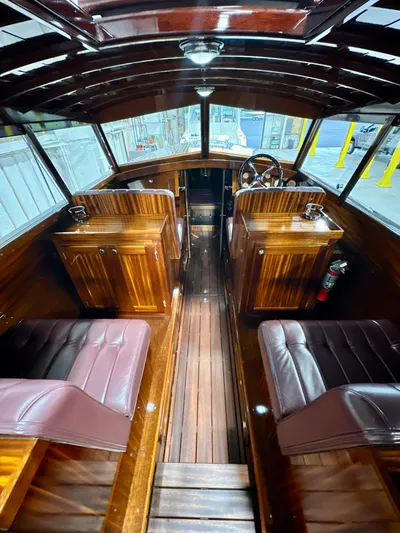 Luv N It Yacht Photos Pics Luxurious 2015 Van Dam 35 boat interior with polished wood and leather seating.