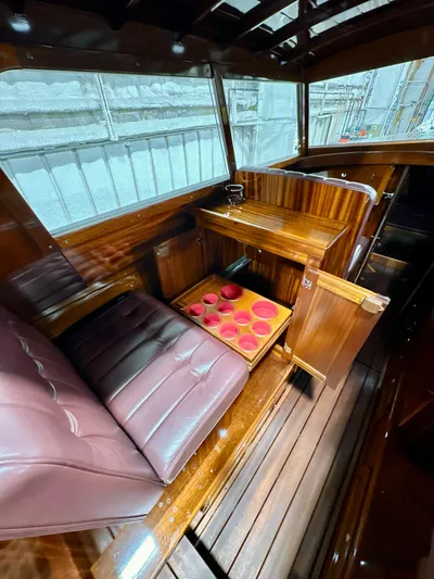 Luv N It Yacht Photos Pics Luxurious 2015 Van Dam 35 boat interior with wooden finish and leather seating.