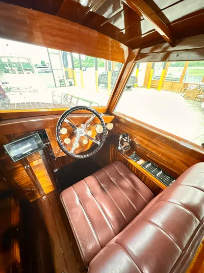 Luv N It Yacht Photos Pics Luxurious 2015 Van Dam 35 boat interior with wooden finish and leather seating.