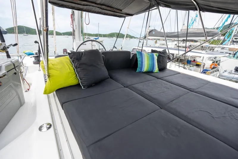  Yacht Photos Pics Luxurious Lagoon 50 catamaran deck with cushions, 2020 model, docked at marina.