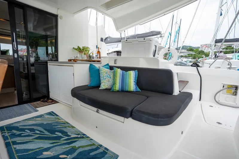  Yacht Photos Pics Luxurious Lagoon 50 yacht interior with cozy seating and vibrant cushions, 2020 model.