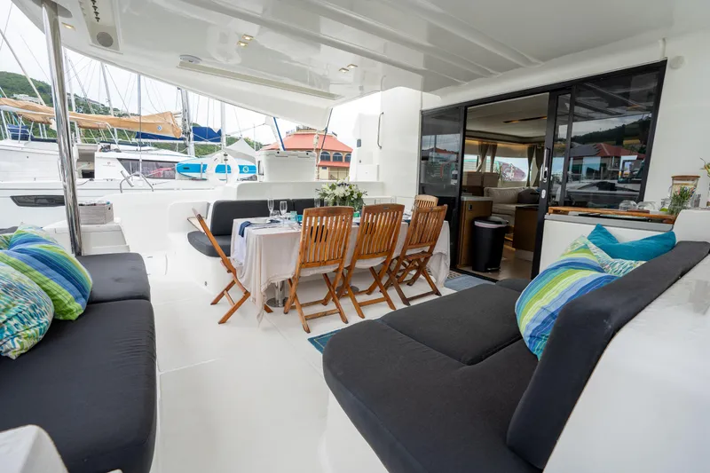  Yacht Photos Pics Luxurious Lagoon 50 yacht interior, featuring elegant dining area and comfortable seating, 2020 model.