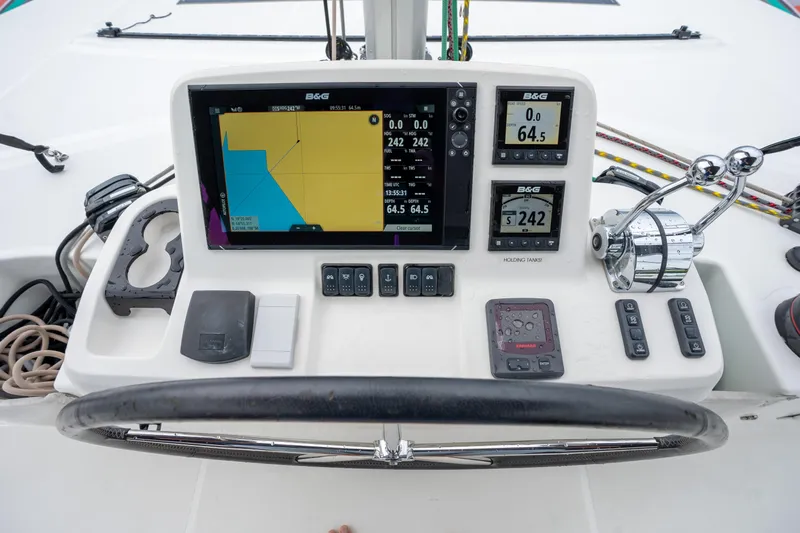  Yacht Photos Pics Helm of 2020 Lagoon 50 catamaran with navigation instruments and steering wheel.