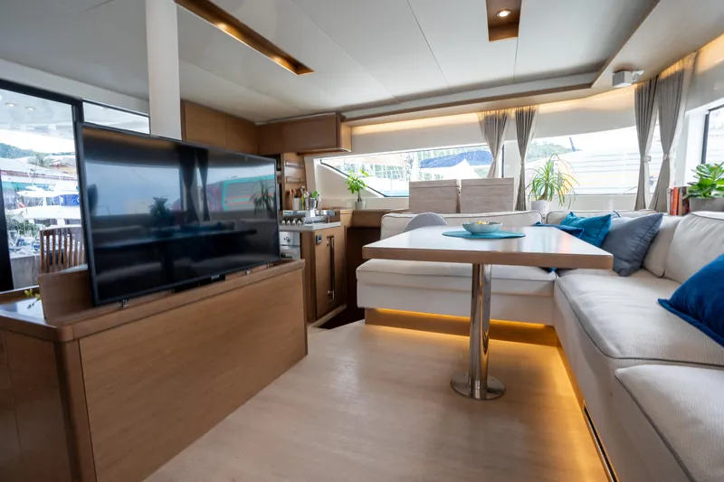  Yacht Photos Pics Luxurious interior of 2020 Lagoon 50 yacht with modern furnishings and large windows.