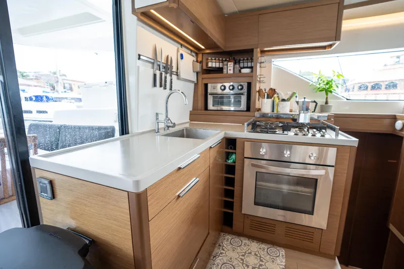  Yacht Photos Pics Modern kitchen in 2020 Lagoon 50 yacht with stove, oven, and sleek cabinetry.