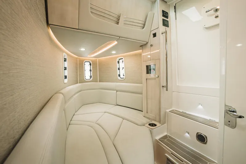 Relapse Yacht Photos Pics Luxurious interior of 2021 HCB 42 Lujo boat with elegant seating and modern design.