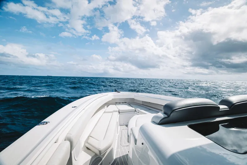 Relapse Yacht Photos Pics 2021 HCB 42 Lujo boat on open sea under cloudy sky.