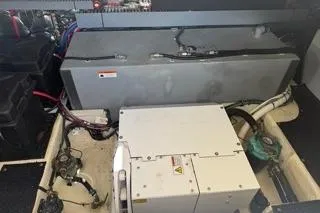  Yacht Photos Pics Engine compartment of 2021 Regal 38 XO boat, showcasing mechanical components and wiring.