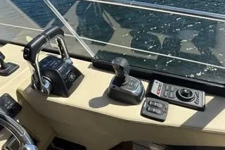  Yacht Photos Pics Control panel of 2021 Regal 38 XO boat with throttle and joystick.