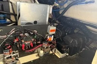  Yacht Photos Pics Engine room of 2021 Regal 38 XO boat, showcasing electrical components and wiring.