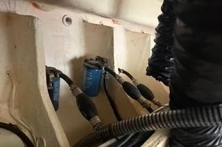  Yacht Photos Pics Engine compartment of 2021 Regal 38 XO boat with visible hoses and filters.