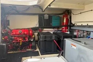  Yacht Photos Pics Engine room of a 2021 Regal 38 XO boat, featuring equipment and wiring.
