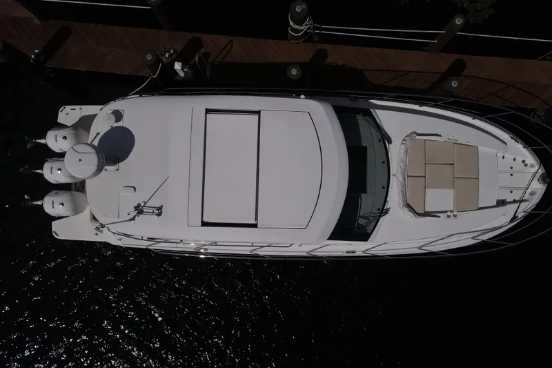  Yacht Photos Pics Aerial view of 2021 Regal 38 XO yacht docked at a marina.