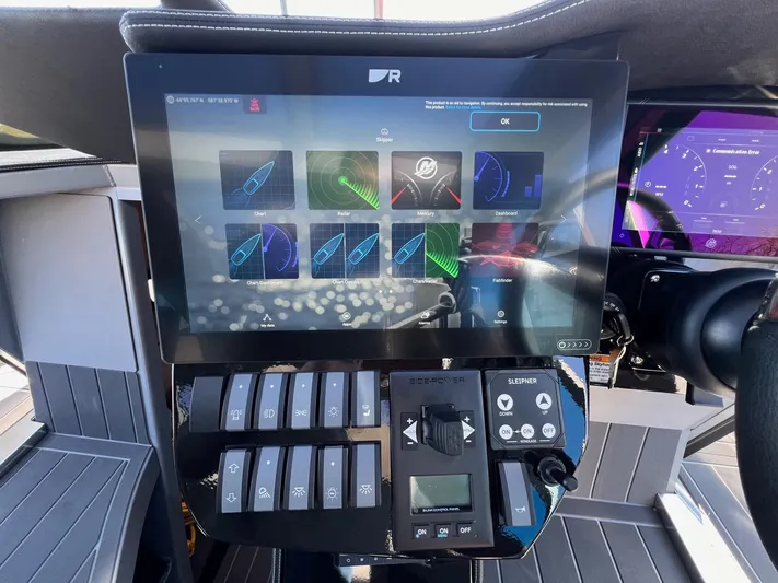 G10 Yacht Photos Pics Touchscreen control panel of 2024 G-Force 10 boat, displaying navigation and system settings.