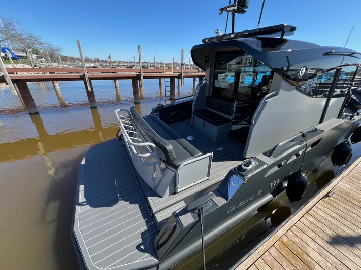 G10 Yacht Photos Pics 2024 G-Force 10 boat docked, showcasing sleek design and modern features.