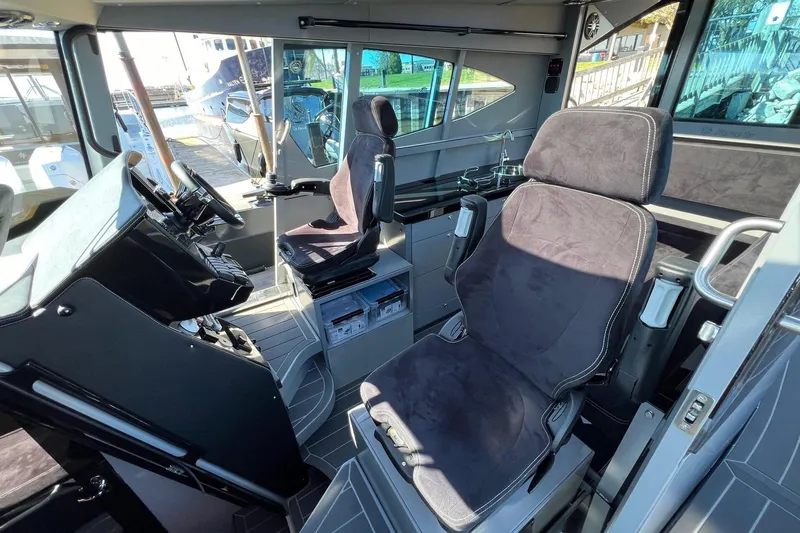 G10 Yacht Photos Pics 2024 G-Force 10 boat interior with modern cockpit and comfortable seating.