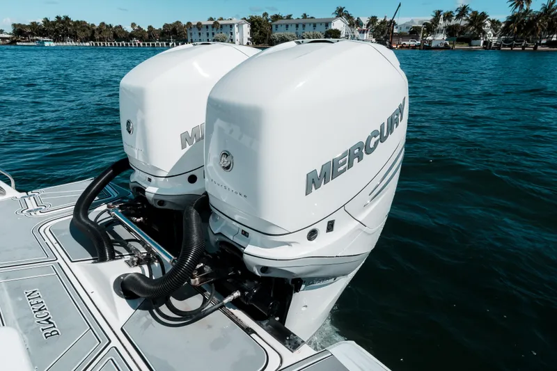  Yacht Photos Pics 2020 Blackfin 332 CC boat with twin Mercury outboard engines on the water.