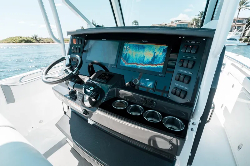  Yacht Photos Pics 2020 Blackfin 332 CC boat dashboard with advanced navigation system and controls.