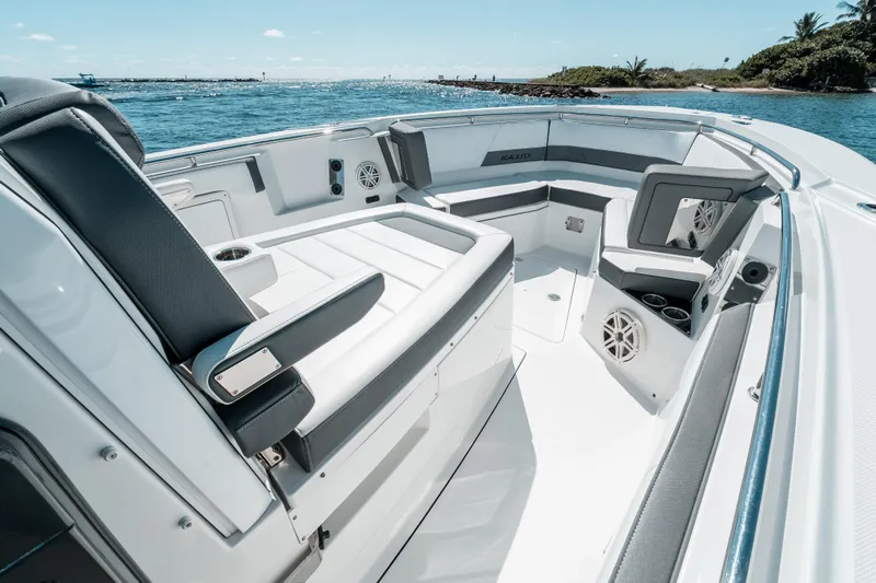 Yacht Photos Pics 2020 Blackfin 332 CC boat interior with luxurious seating and ocean view.