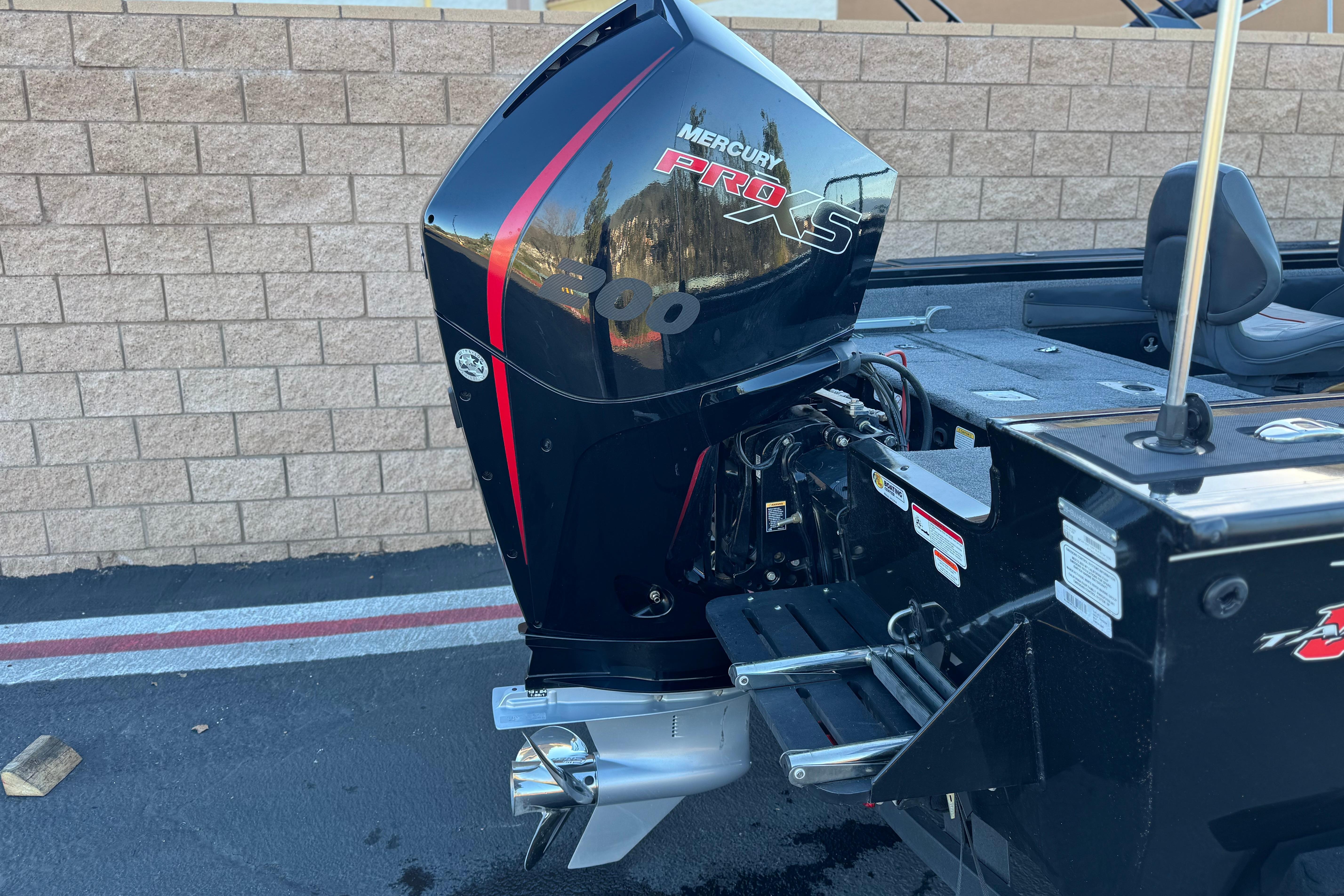 2023 Tracker Targa V-19 WT with Mercury Pro XS 200 engine, parked outdoors.