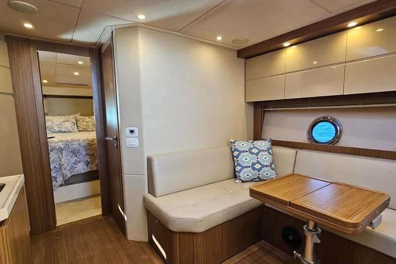  Yacht Photos Pics Luxurious interior of 2015 Azimut Atlantis 50 yacht with cozy seating and elegant decor.