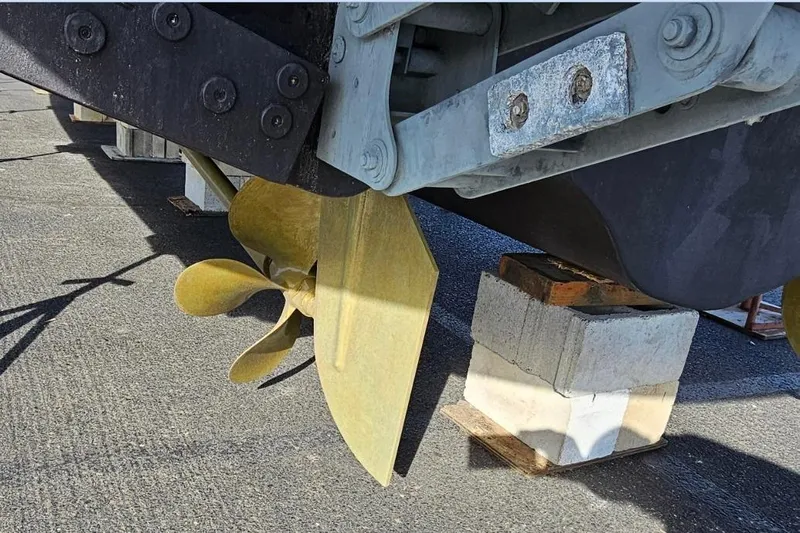  Yacht Photos Pics Propeller of 2015 Azimut Atlantis 50 yacht on blocks, showcasing marine engineering.