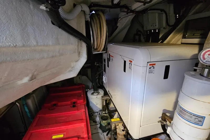  Yacht Photos Pics Engine room of 2015 Azimut Atlantis 50 yacht with equipment and storage.