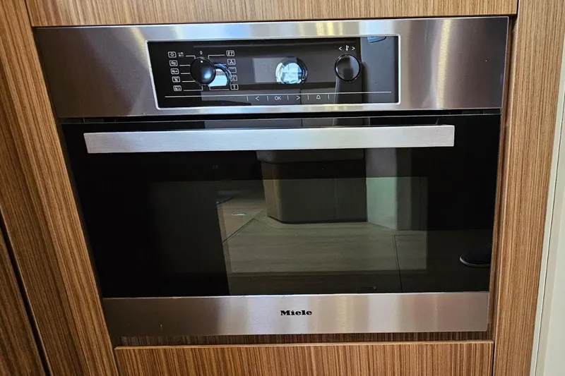  Yacht Photos Pics Built-in Miele oven in Azimut Atlantis 50 yacht kitchen, 2015 model.