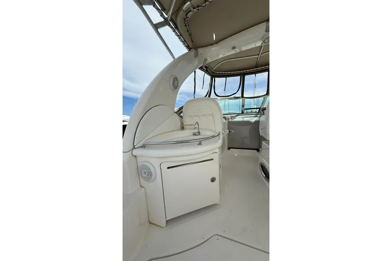  Yacht Photos Pics 2006 Sea Ray 340 Sundancer interior with sink and cabinetry under canopy.