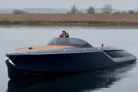 2024 Frauscher 858 Fantom luxury boat on calm water, sleek design, modern elegance.