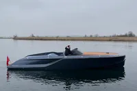 2024 Frauscher 858 Fantom luxury motorboat on calm water.