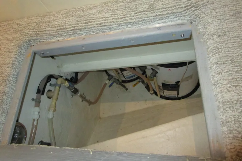 Shore Girl Yacht Photos Pics Hidden compartment with plumbing in 2005 Neptunus Enclosed Skylounge yacht.