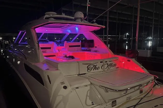  Yacht Photos Pics 2010 Sea Ray 450 Sundancer yacht with vibrant interior lighting at night.