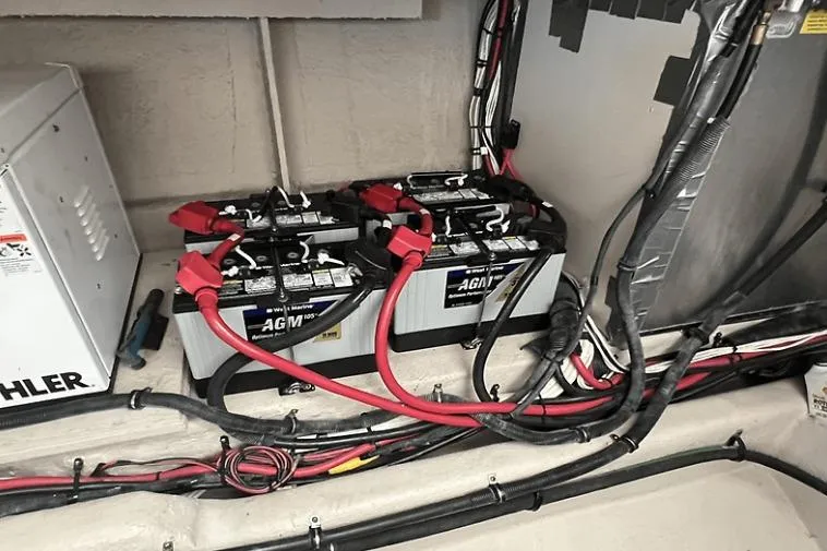  Yacht Photos Pics Battery compartment of a 2010 Sea Ray 450 Sundancer with AGM batteries and wiring.