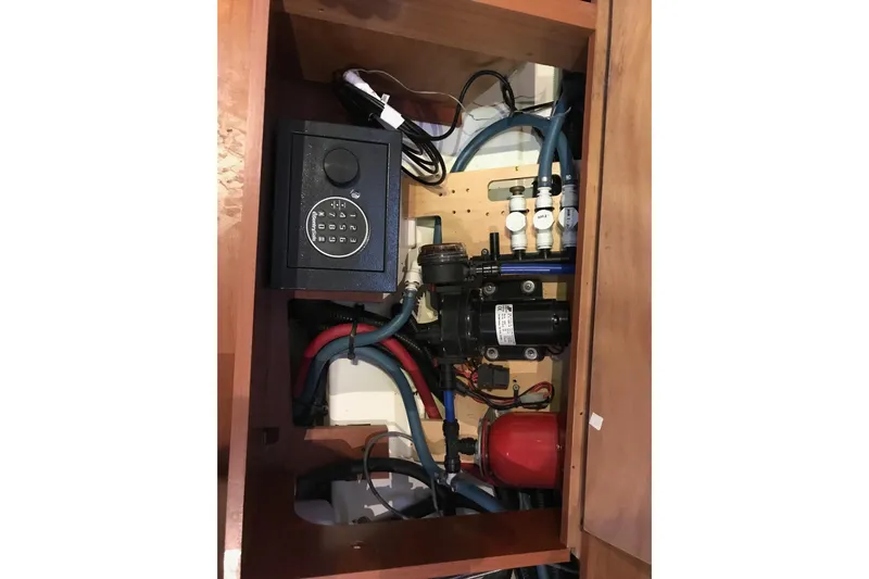 At Last Yacht Photos Pics Electrical and plumbing system inside a 2012 Beneteau Oceanis 45 yacht.