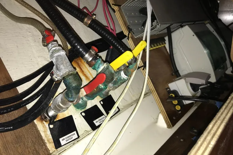 At Last Yacht Photos Pics Plumbing and wiring system inside a 2012 Beneteau Oceanis 45 yacht.