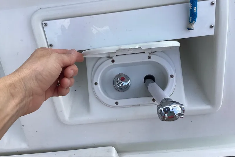 At Last Yacht Photos Pics Hand opening compartment on 2012 Beneteau Oceanis 45 sailboat.